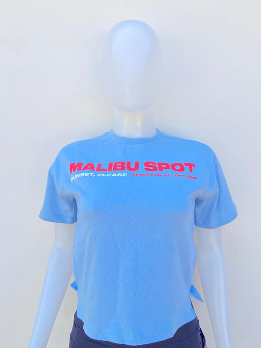 T-shirt ZARA Original en color azul con letra roja al frente MALIBU SPOT sunset, Please beach fun, all day long.