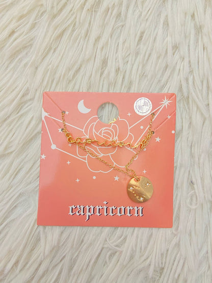 Cadena FOREVER 21 Original de dos piezas una con el nombre del signo CAPRICORNIO y otra con una medalla