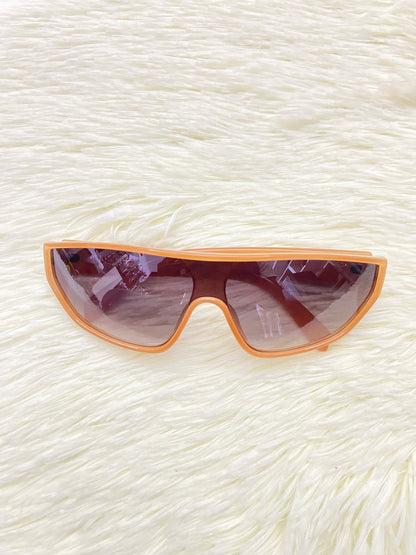 Lentes, naranja oscuro con micas eñ color negro claro, 100 % Polycarbonate y protección UV.