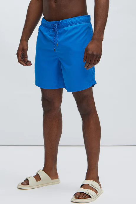 Bañador Baggy azul con lazos ajustables y detalles en plateado .