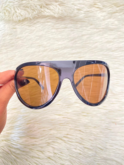 Lentes, marrones con micas en color  marrón claro, ovalados grandes.