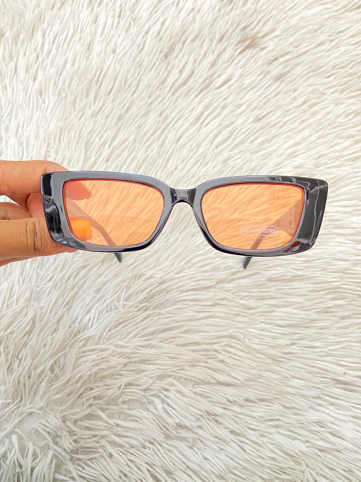 Lentes Fashion Nova original negros con micas naranja.