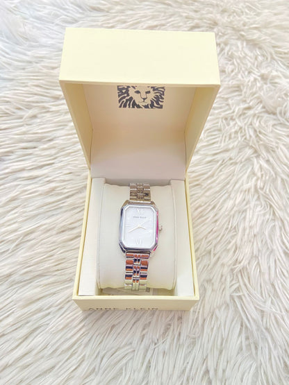 Reloj ANNE KLEIN original plateado con números romanos