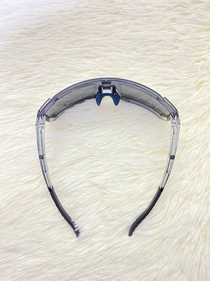 Lentes, gris con micas que cambian de color a dorado cromados, 100 % Polycarbonate más protección UV.