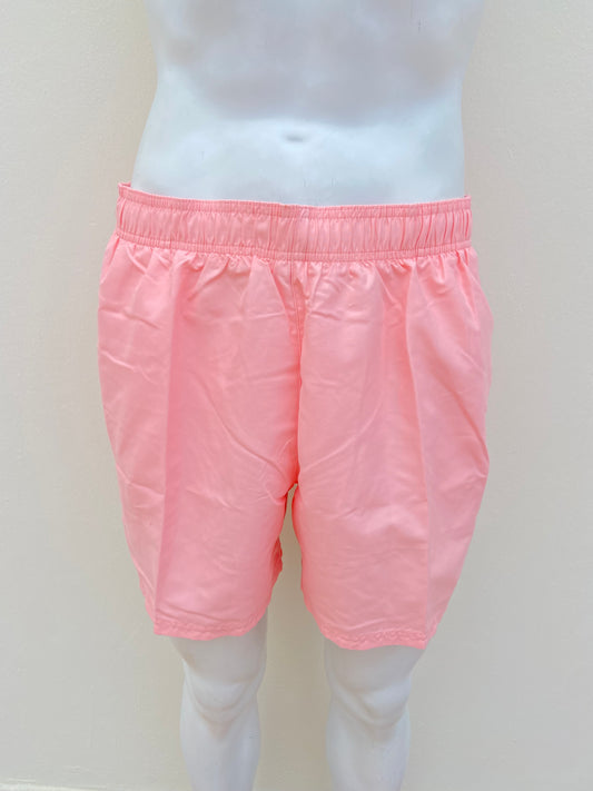 Bañador/Baggy NIKE original rosado claro con logotipo de la marca al lado.