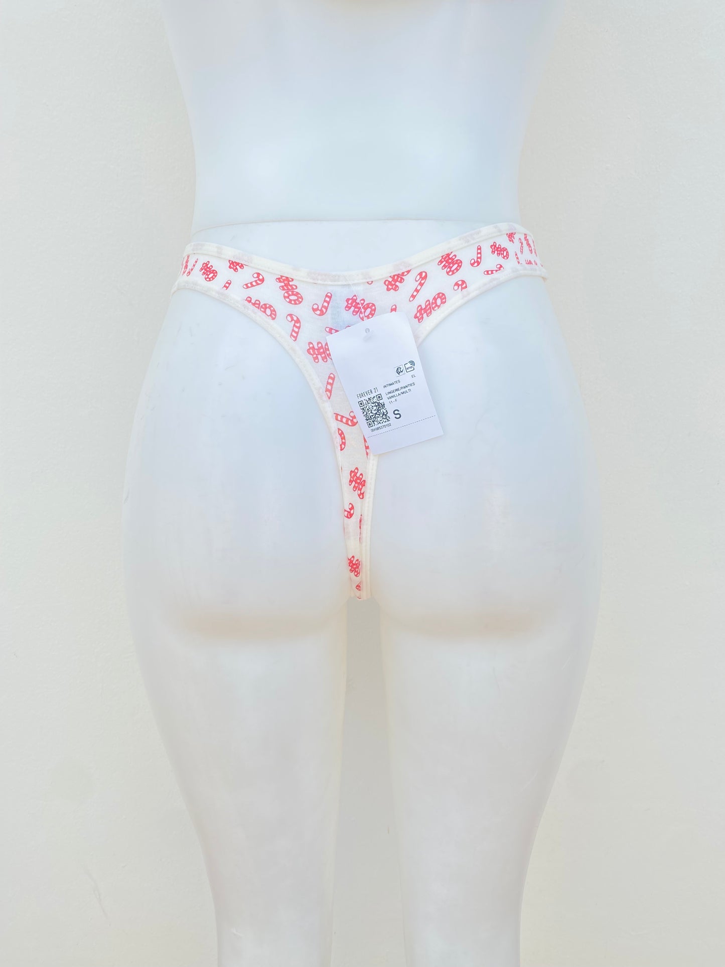 Panti Forever 21 original, blanco hueso con diseño de bastones dulces en rojo.