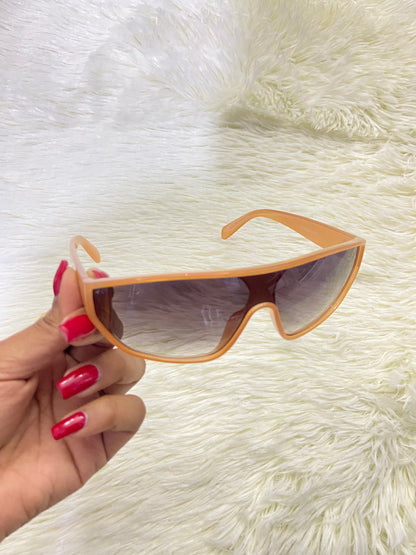 Lentes, naranja oscuro con micas eñ color negro claro, 100 % Polycarbonate y protección UV.