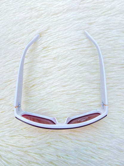 Lentes, multicolor con montura en color blanco y protección UV 100%.