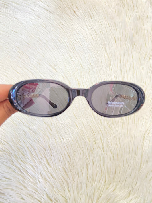 Lentes, negro con montura en estilo Cadena dorada y micas claras, ovalados, con protección UV 100-400