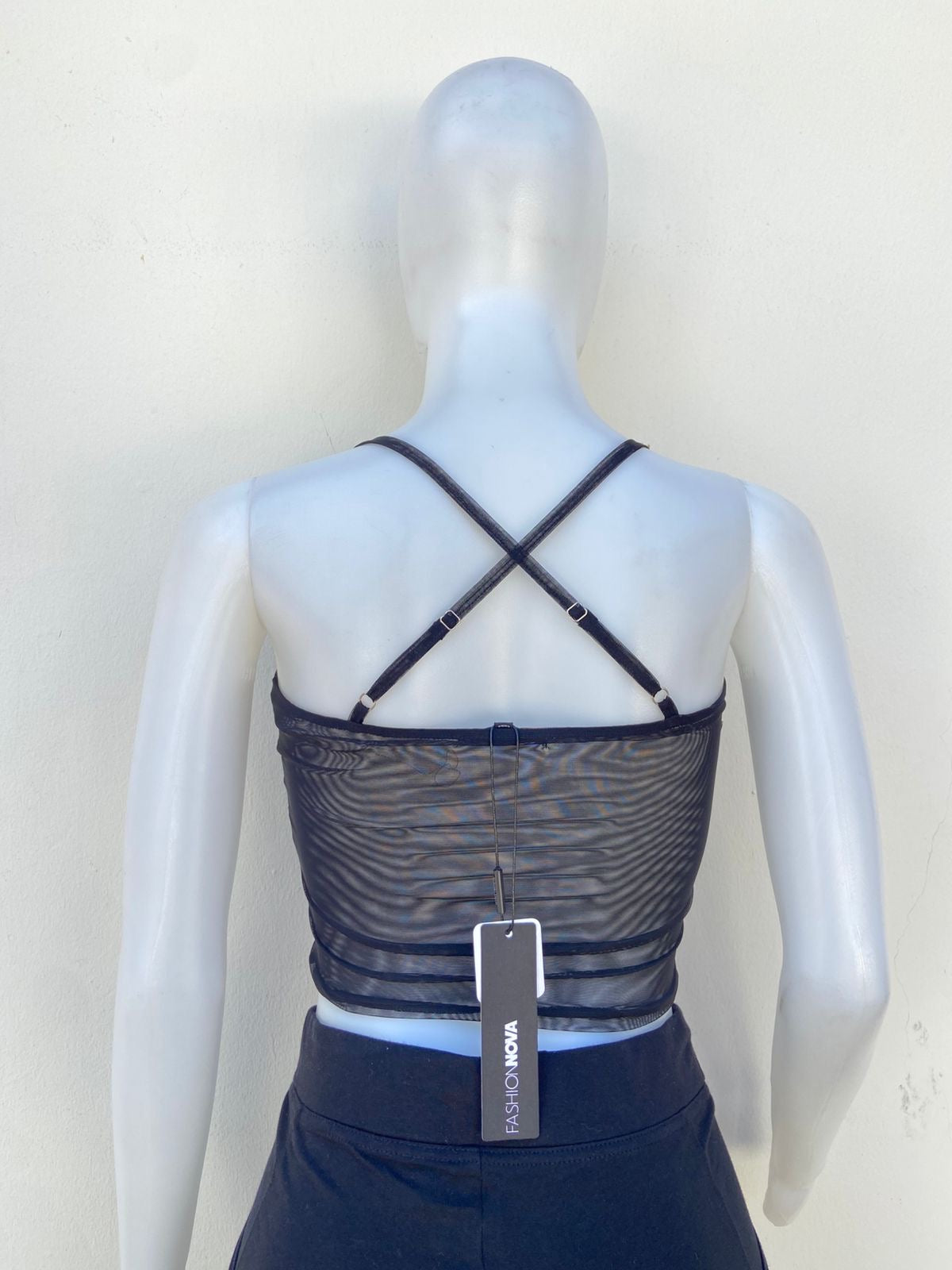 Top, negro transparente con abiertos en frente.