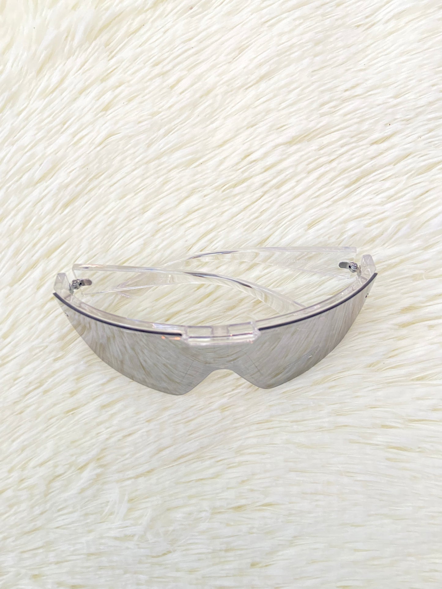 Lentes, plateados grandes con montura transparente, 100 % Polycarbonate y protección UV.