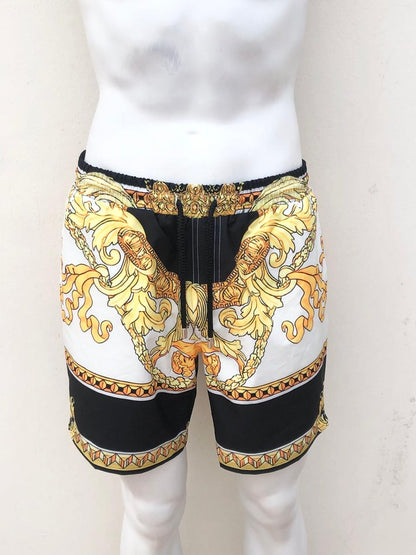 Bañador/Baggy, blanco con negro y diseño de cadenas dorada.