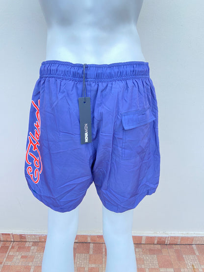 Bañador/Baggy, ED HARDY original azul marino con estampado de palmera y arcoíris.