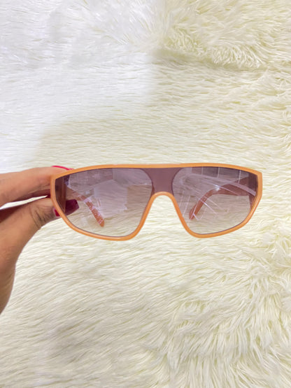 Lentes, naranja oscuro con micas eñ color negro claro, 100 % Polycarbonate y protección UV.