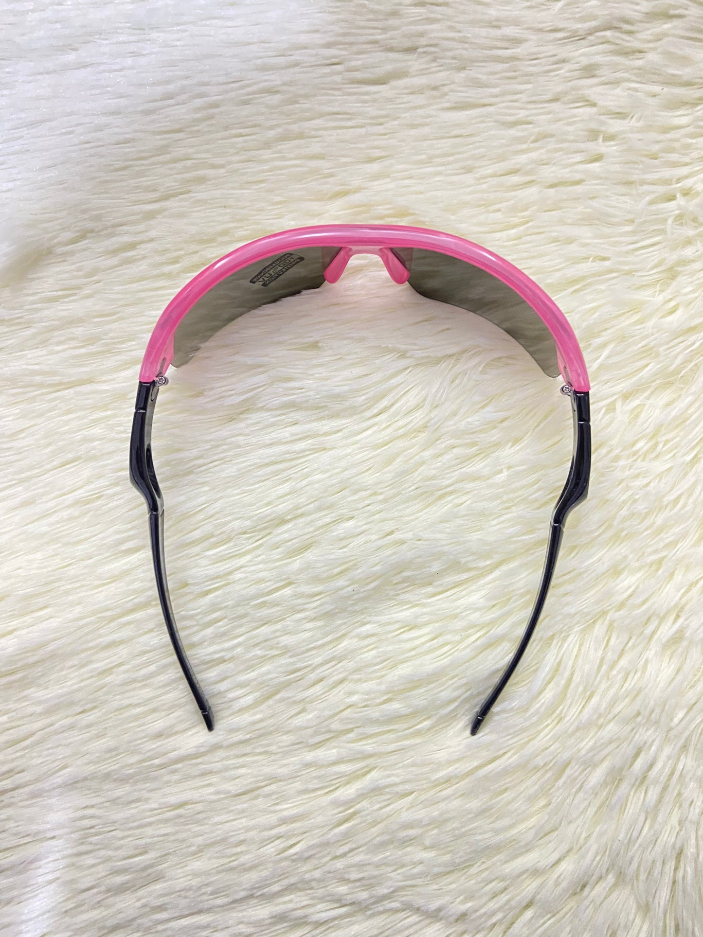 Lentes, rosados con negros y micas que cambian de color, con 100 % Polycarbonate y protección UV.