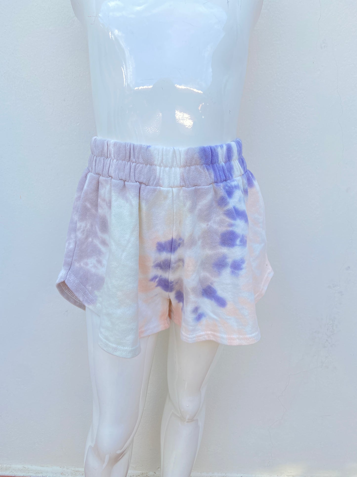 Short T.I.M.I.N.G original blanco con morado y naranja degradado.