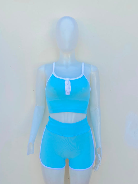 Conjunto JULIA BY LOVE J Original legging y top en color azul con manga de tiros y detalle al frente en color blanco.