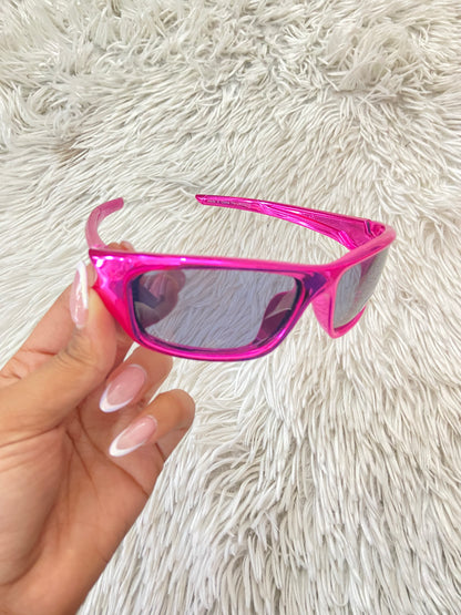 Lentes diseñados con protección UV 100-400 para proteger tu visión. Rosado metálico, micas oscuras.