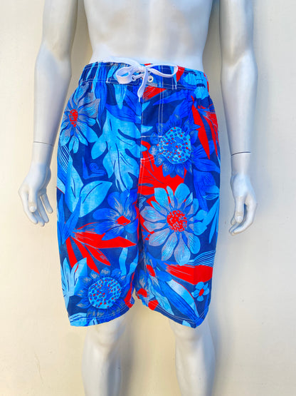 Bañador/Baggy KANU SURF original, azul con estampado de flores naranja, interior en malla transpirable con bolsillos laterales.