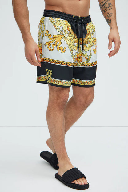 Bañador/Baggy, blanco con negro y diseño de cadenas dorada.