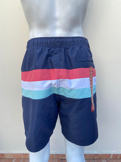Bañador/Baggy NAUTICA  original, azul marino con rayas en color blanco, rosado y azul.