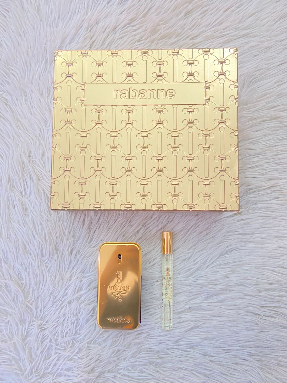 Set de dos 1 MILLION Paco Rabanne Original perfume y mini perfume en color dorado.