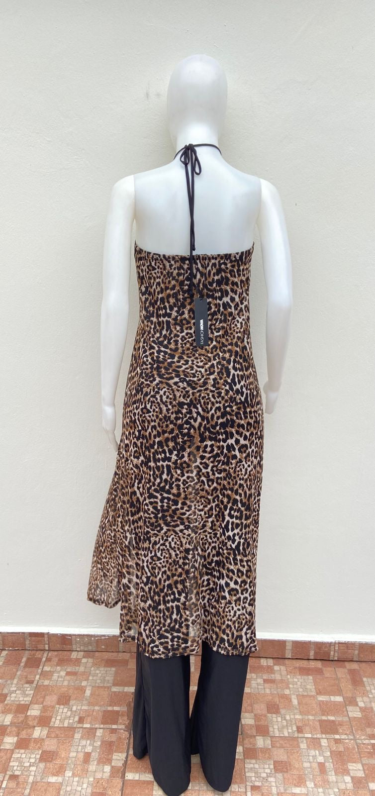 Enterizo/ Jumpsuit, negro con estampado de animal print y estrella en frente.
