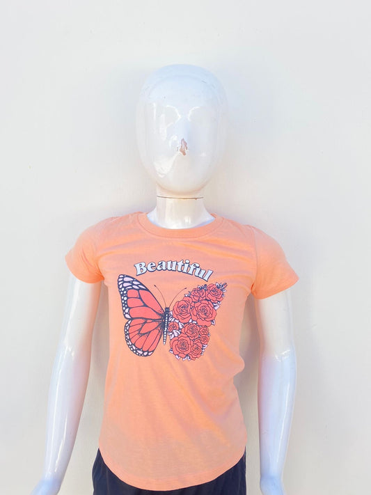 T-shirt CHIT CHAT original naranja pastel con estampado de una mariposa ( BEAUTIFUL ).