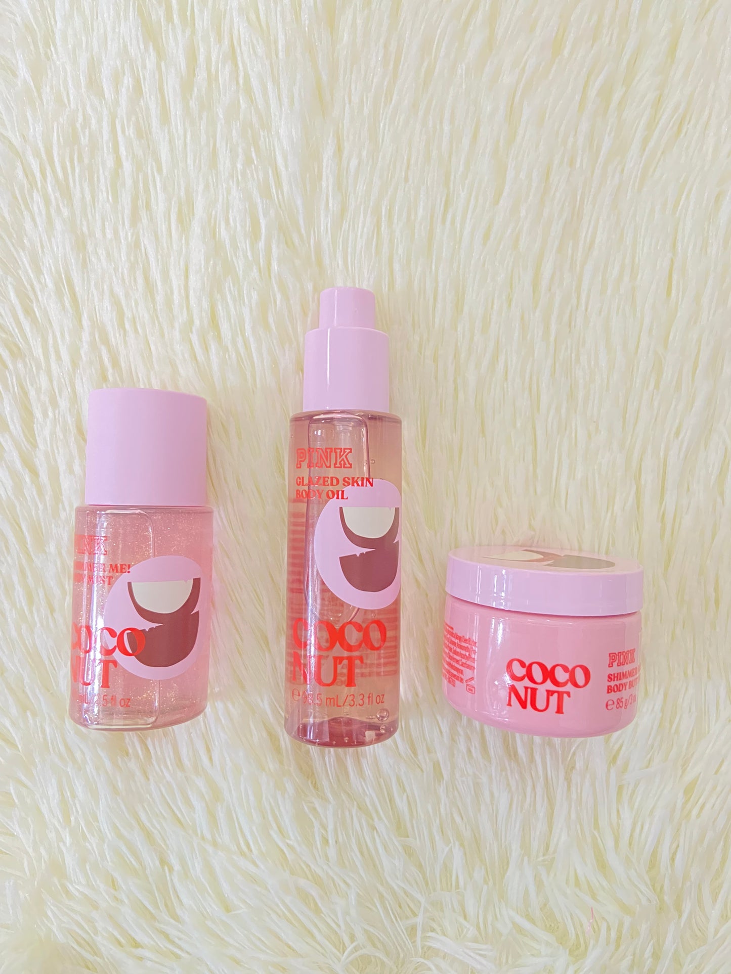 Pack PINK original, de colonia, aceite y crema minis, COCONUT rosada,con brillitos. Más el bolso