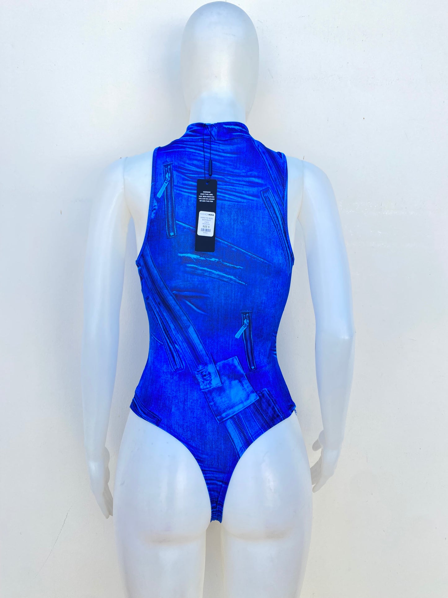 Body azul combo, con estampado de zipper.