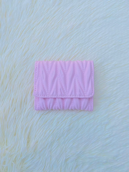 Monedero pequeño rosado diseño acolchado, cierre de boton y súper espacioso