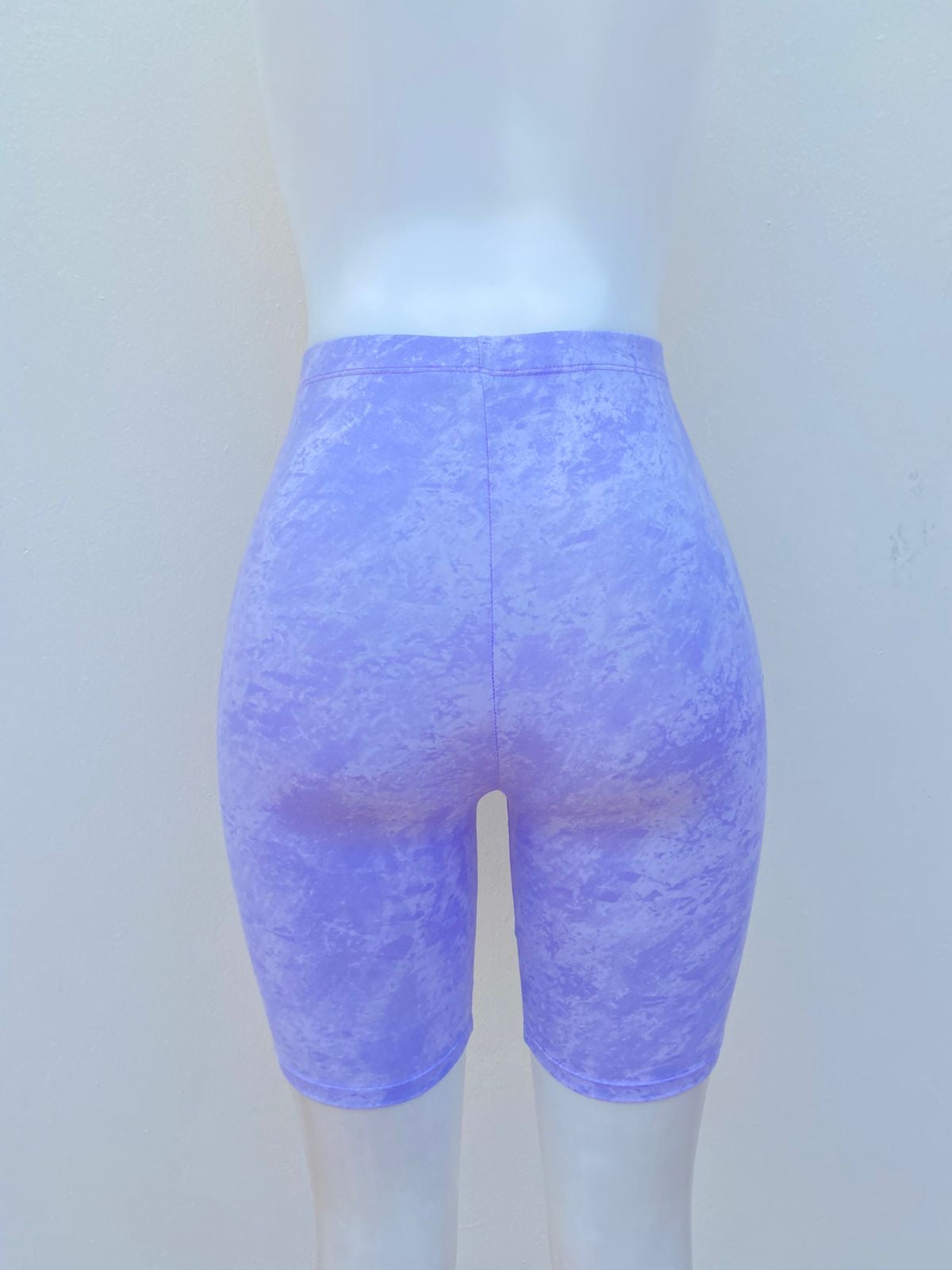 Legging/licra, morado lila con blanco, bicicleta.