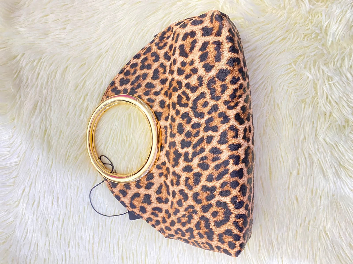 Cartera, marron con estampado de animal print y Cadena adicional.