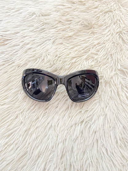 Lentes, diseñados con protección UV 100-400 para proteger tu visión. Negro con micas oscuras,ovalados grandes..