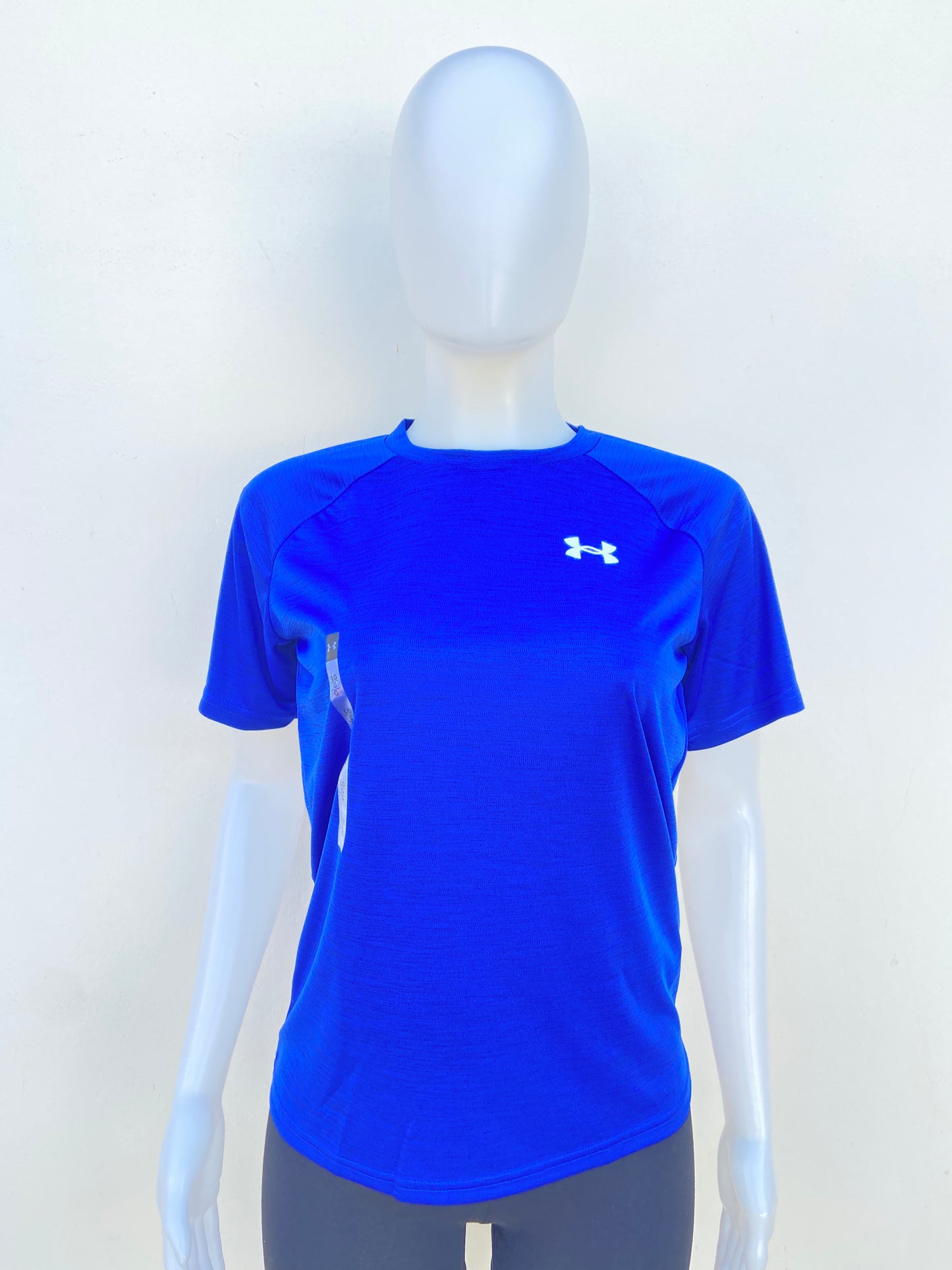 T-shirt Under Armour original azul con logotipo de la marca al lado.