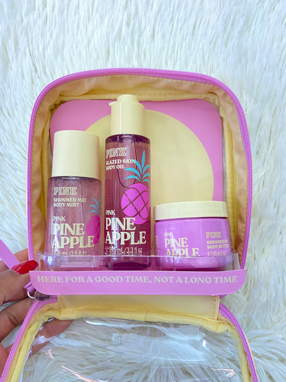 Pack PINK original, de tres colonia, aceite y crema minis PINEAPPLE,con brillitos. Más el bolso