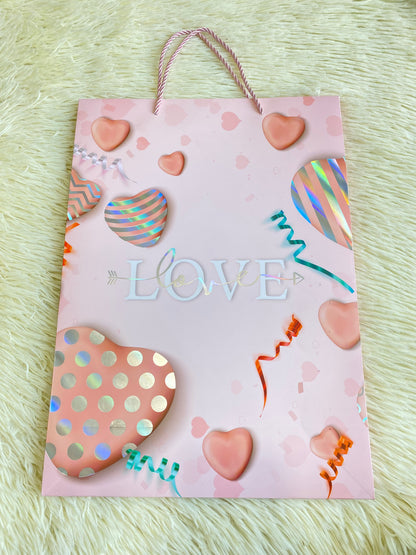 Shopping rosado claro, con corazones y letra LOVE en el centro. GRANDE