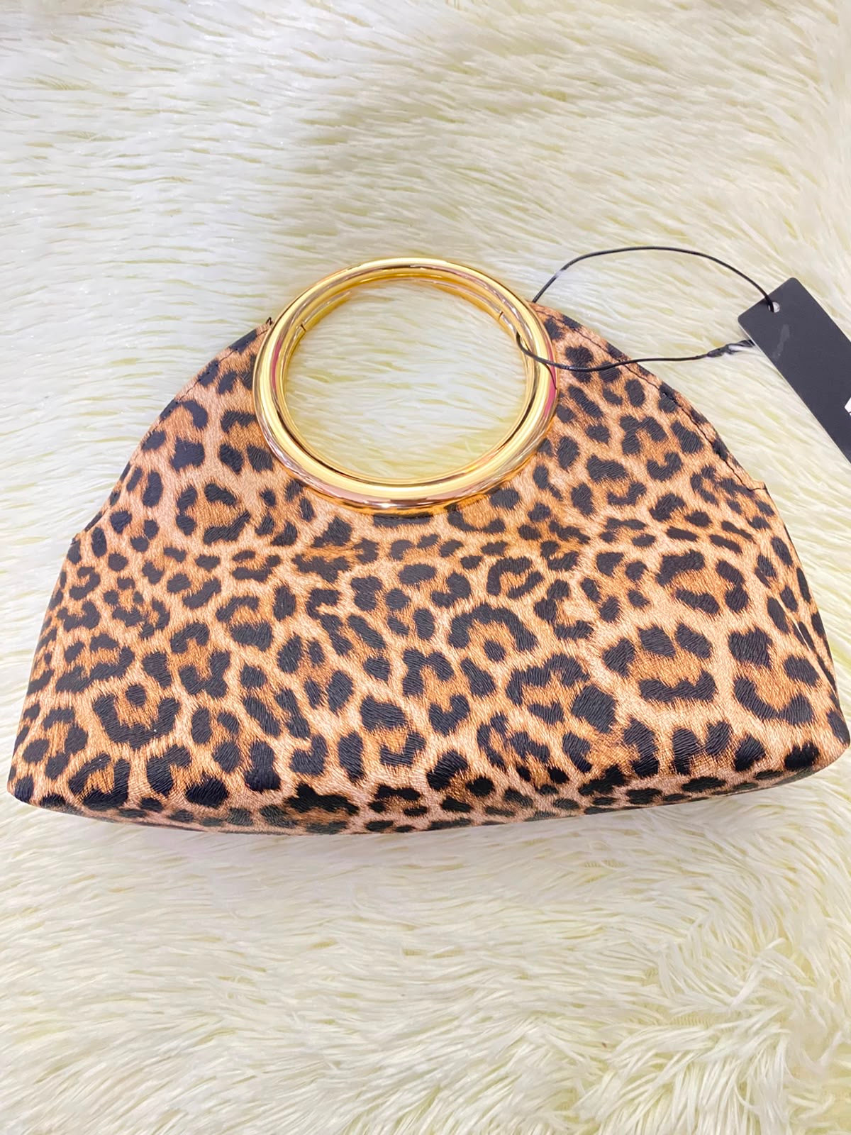 Cartera, marron con estampado de animal print y Cadena adicional.