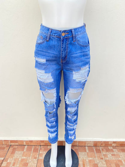 Pantalón jean color azul varios rasgados