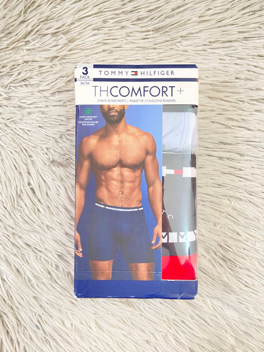Boxer Tommy Hilfiger Original 3-pack en color azul claro, azul marino con nombre de la marca repetido varias veces y otro en color rojo.