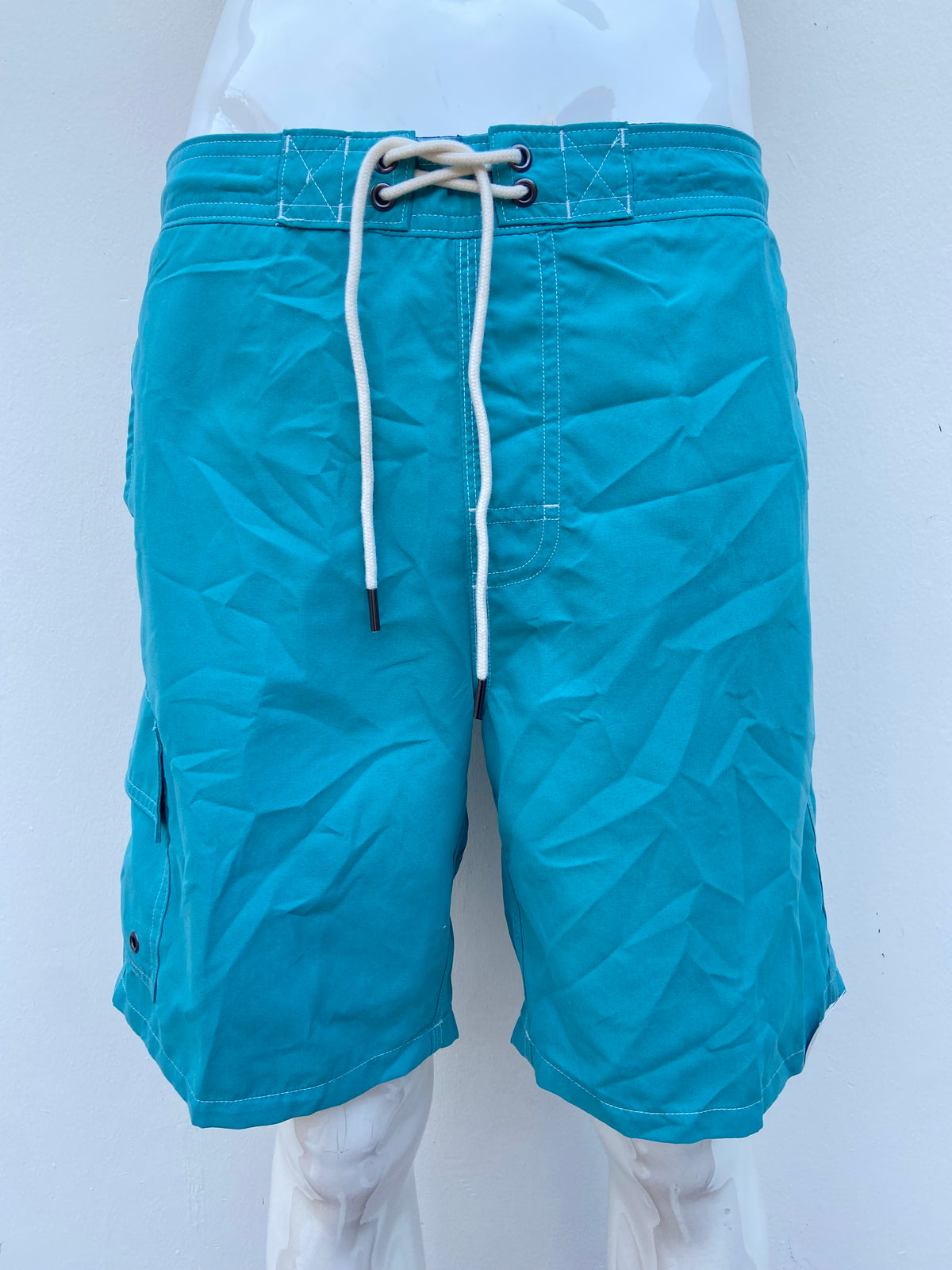 Baggy/bañador, azul turquesa liso con lazos ajustables blancos Protección UPF 50+: Brinda protección contra los rayos UV.