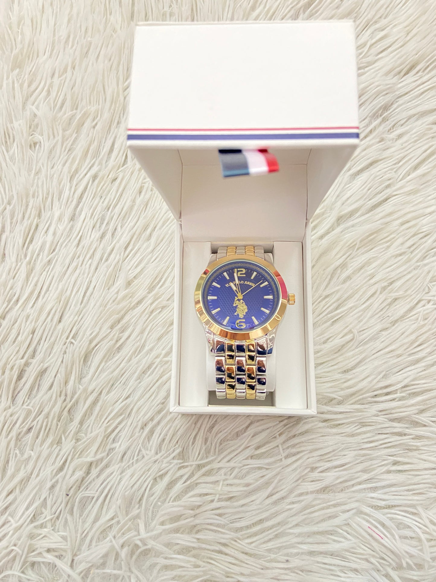 Reloj U.S POLO ASSN SINCE 1980 original dorado con plateado y azul marino.