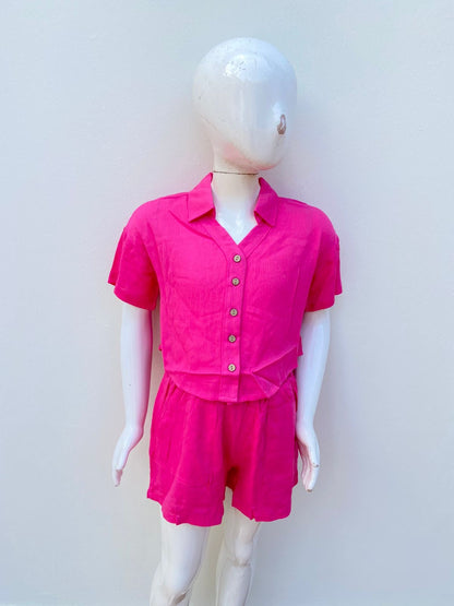 Conjunto para niñas, rosado fucsia, de short y camisa.