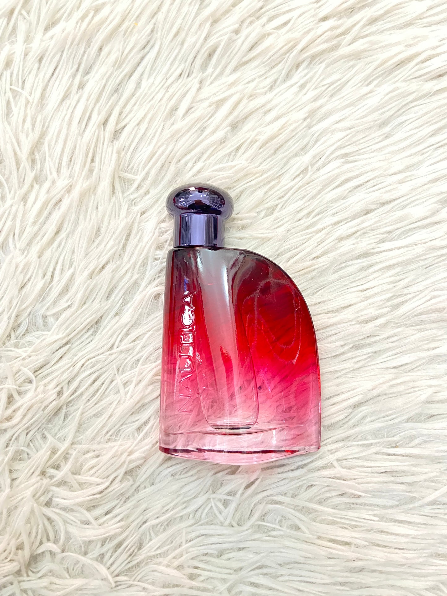 Set NAUTICA RED original, con desodorante y perfume en color rojo y plateado.