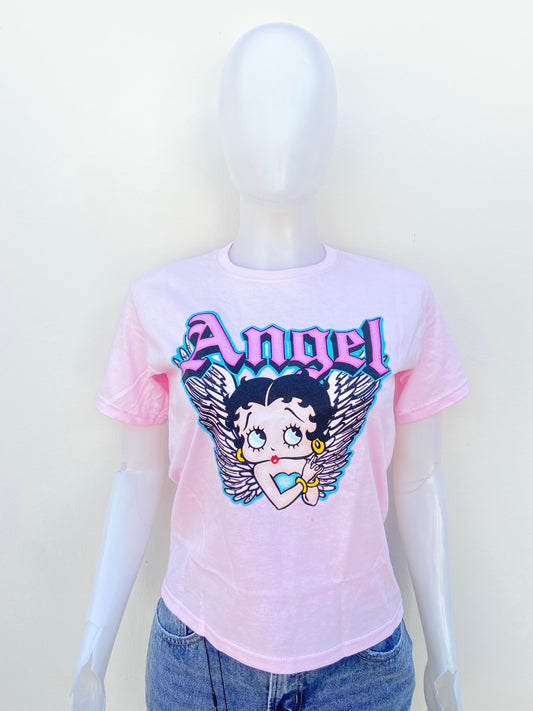 T-shirt FLEISCHER STUDIOS original rosado claro con estampado de una muñeca y letras ÁNGEL.
