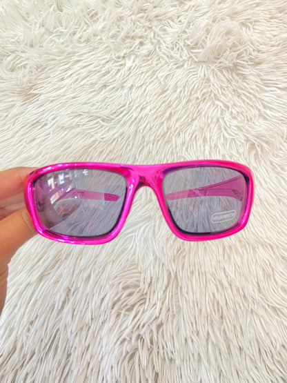 Lentes diseñados con protección UV 100-400 para proteger tu visión. Rosado metálico, micas oscuras.