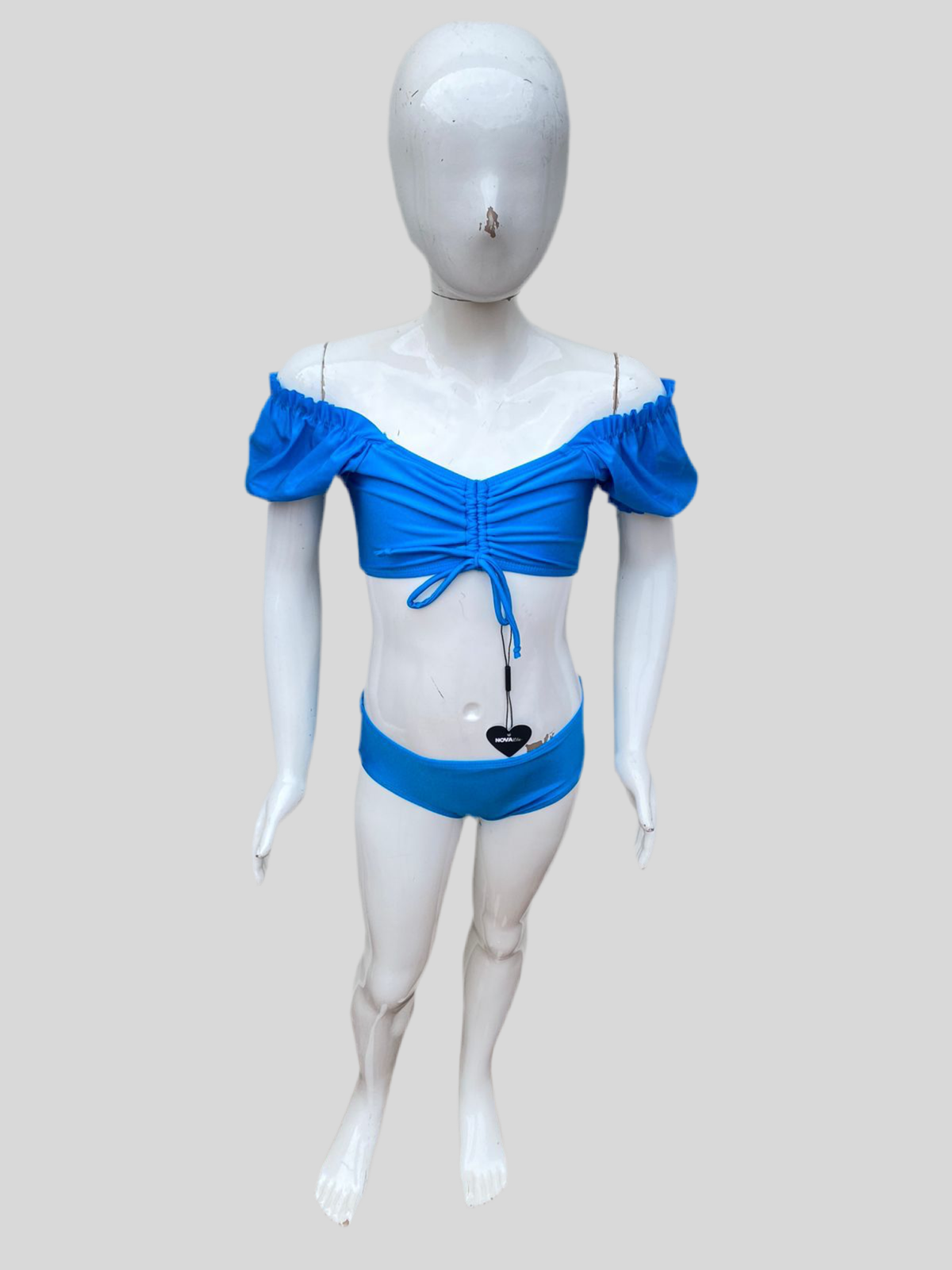 Biquini Traje de baño niñas original azul con lazos ajustables en frente.