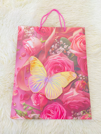 Shopping, rosado con rosas  y mariposa en frente.