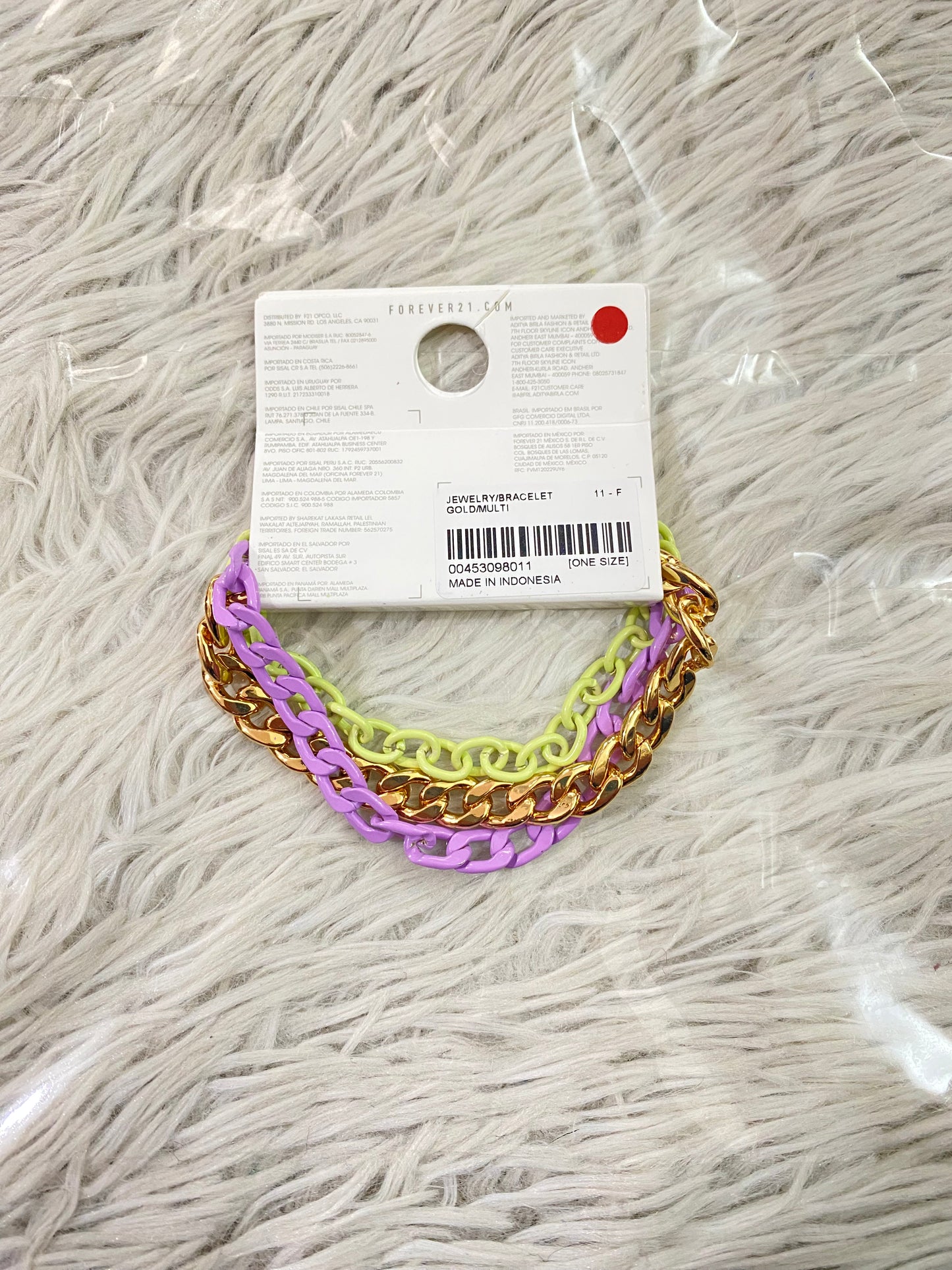 Pulsera Forever 21 original, 3 piezas, tejidos deferentes en morado, verde y dorado.