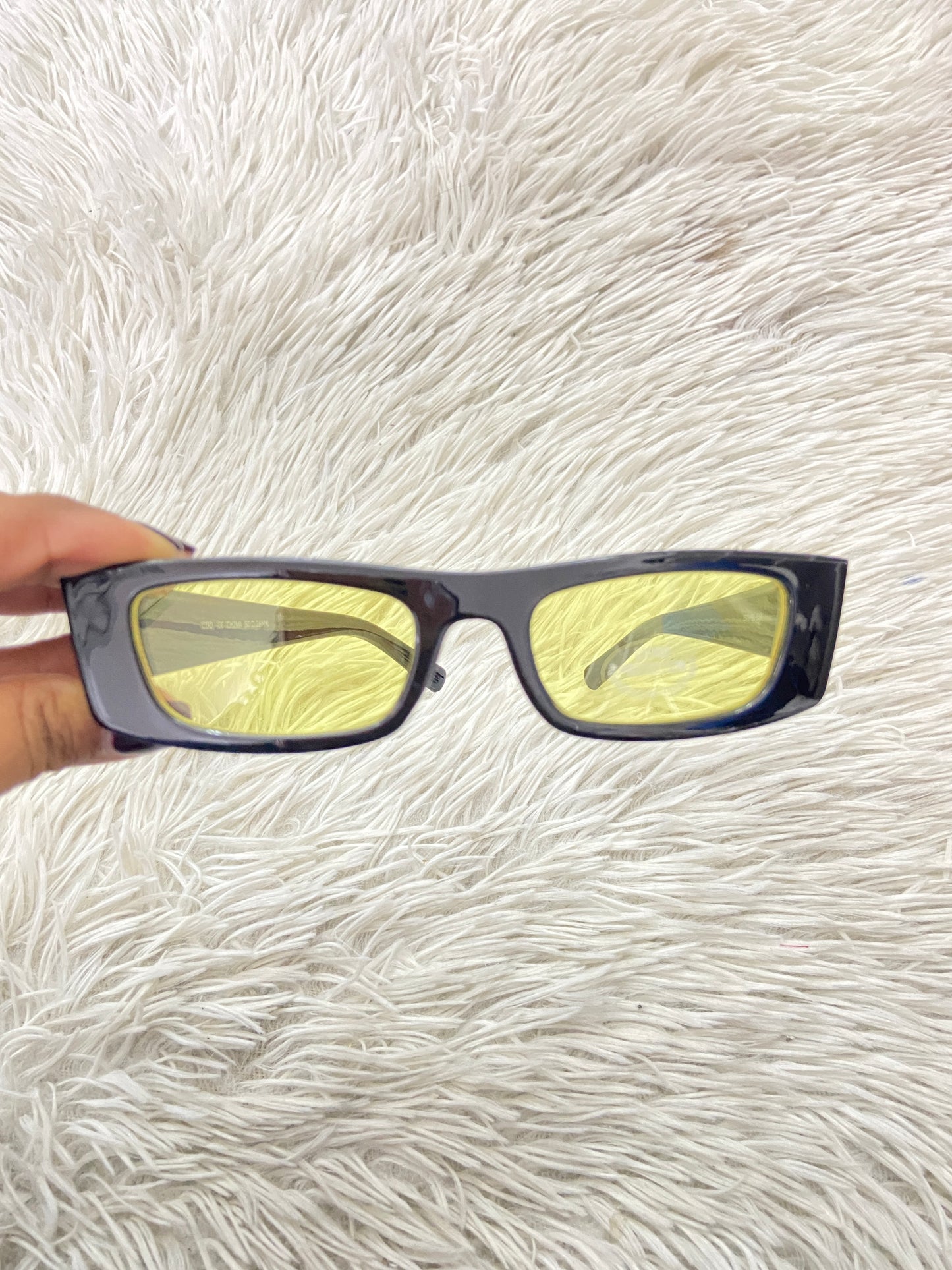 Lentes, negro con micas en color amarillo transparente.